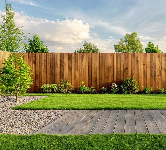 Beautiful backyard with lush green artificial lawn